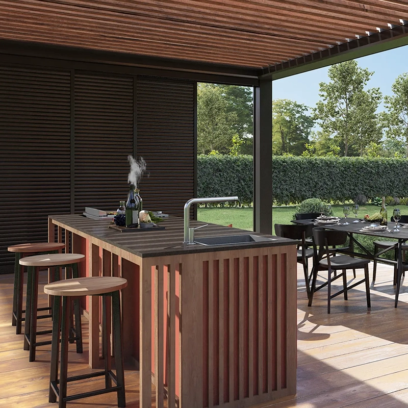 Une terrasse avec une pergola et une cuisine extérieur terracota
